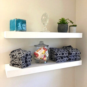 white floating shelves