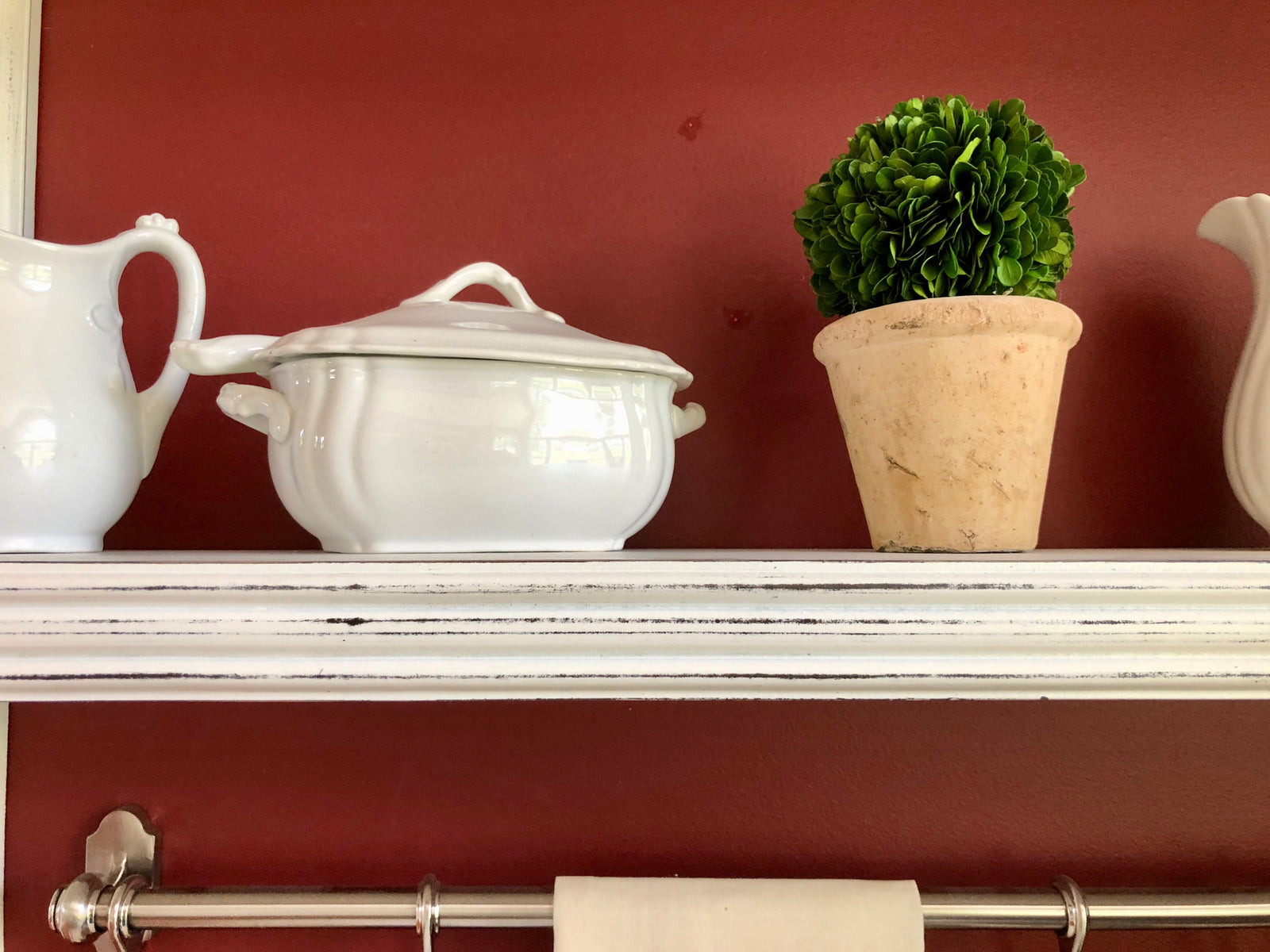 farmhouse shelf with wood brackets