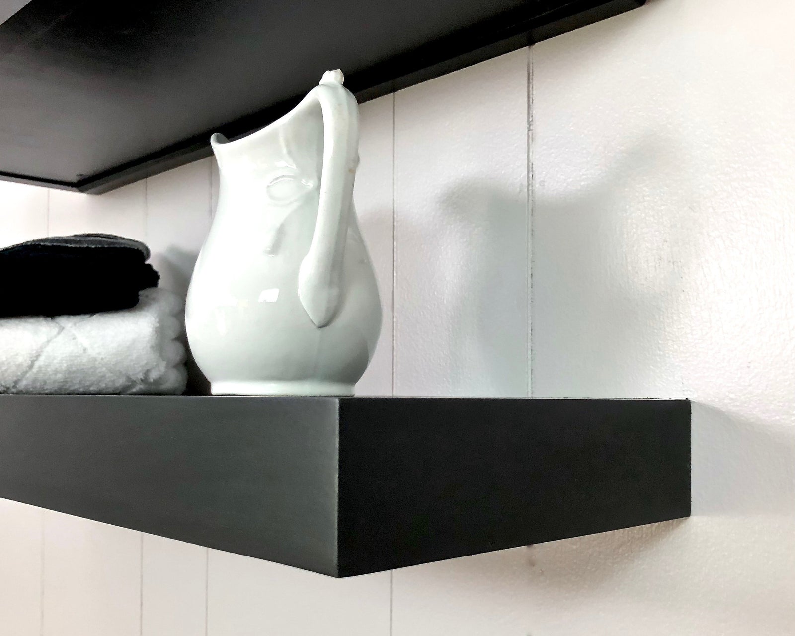 black floating shelves
