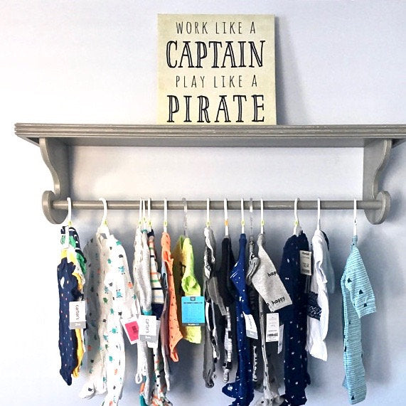 Shelf with hanging rod